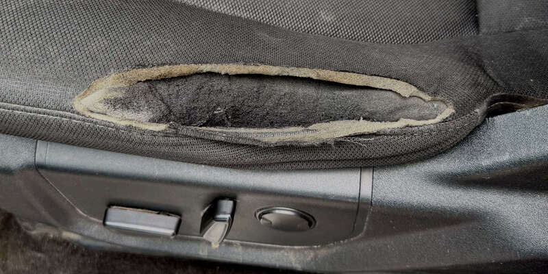 Before: torn hole in fabric seat