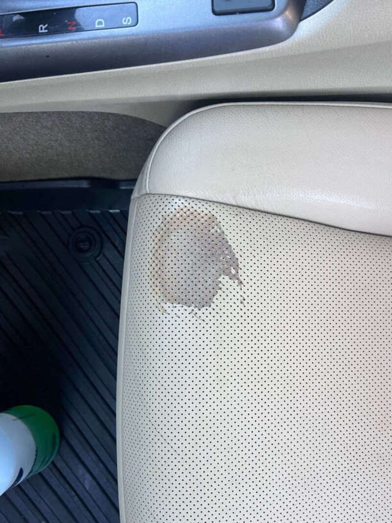 Before: worn discolored patch on perforated leather seat bolster