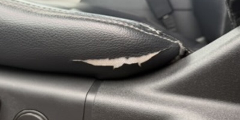 Before: torn leather seat bolster corner